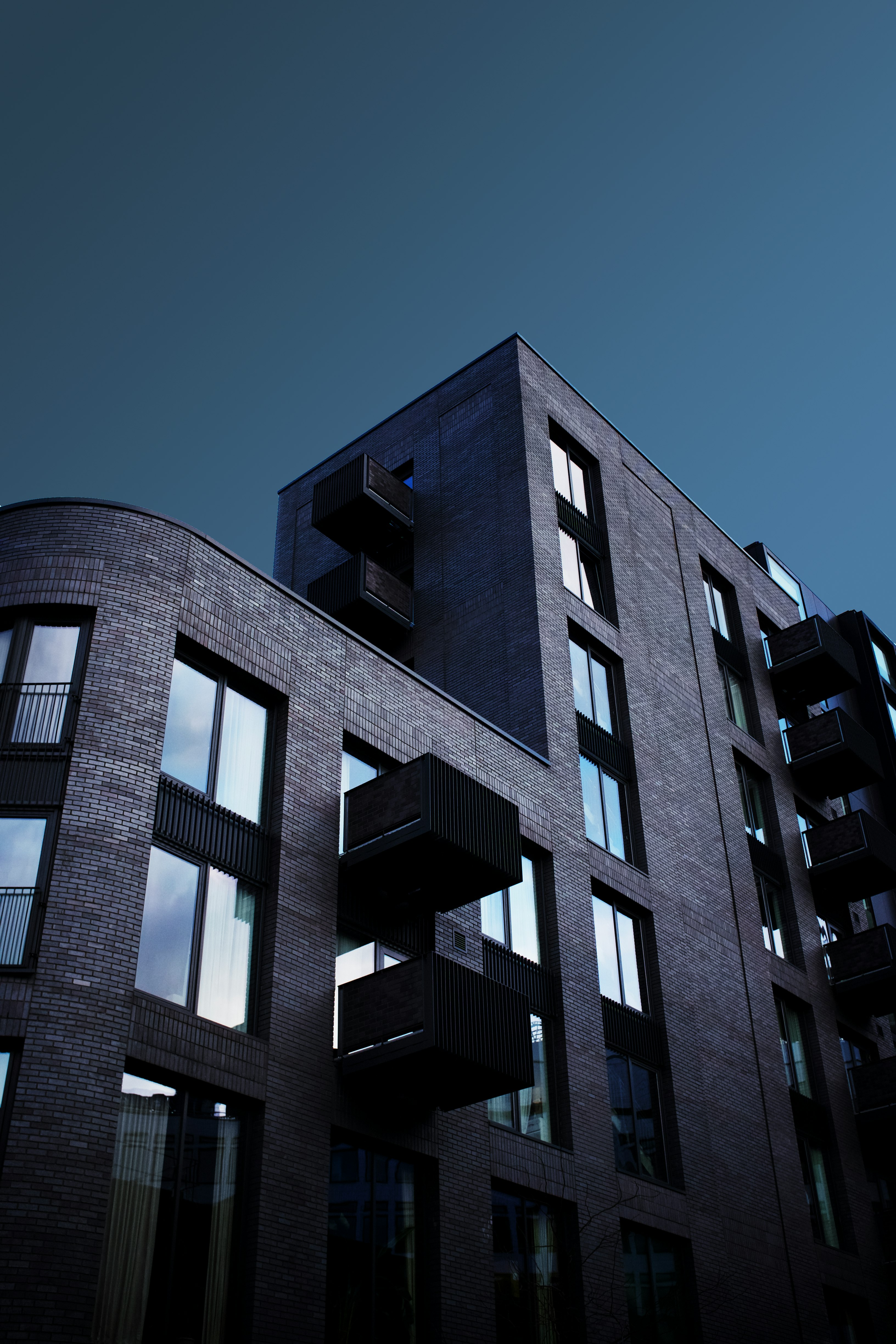 black concrete building under blue sky during daytime